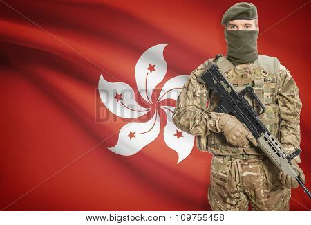 Soldier Holding Machine Gun With Flag On Background Series - Hong Kong