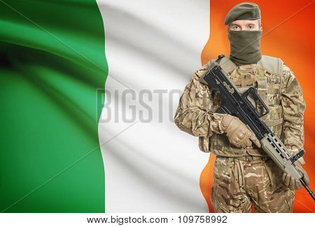 Soldier Holding Machine Gun With Flag On Background Series - Ireland