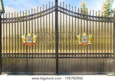 Metal door with Coat of Arms of Romanian Orthodox Church on March 13, 2015 in Bucharest, Romania
