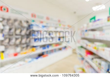 medicine, pharmacy, health care and pharmacology concept - pharmacy or drugstore room blurred background