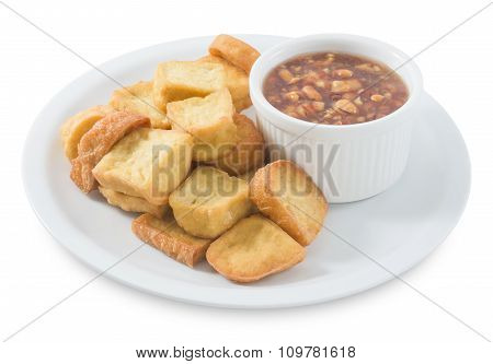 Fried Tofu Bubble With Sweet Sauce On White Background