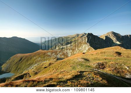 Panorama of Tatra Mountains Carpathians sun sunset dawn Nature background Nature landscape Nature background sky colors vibrant Nature background Travel Tourism hiking Adventure Mount Nature background sunrise Nature background Summit Peaks mountain.