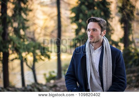 Handsome young man outdoor in winter fashion