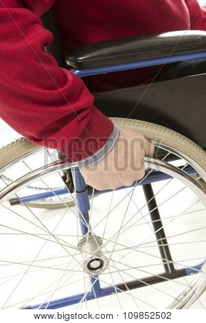 Wheelchair user makes various movements with his wheelchair, exercises for safety handling