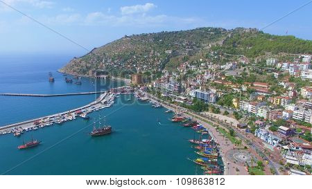 ALANIA - AUG 16, 2015: Cityscape with Alania Sea Port at summer sunny day. Aerial view videoframe