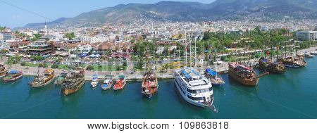 ALANIA - AUG 16, 2015: City panorama with Alania Sea Port at summer sunny day. Aerial view videoframe