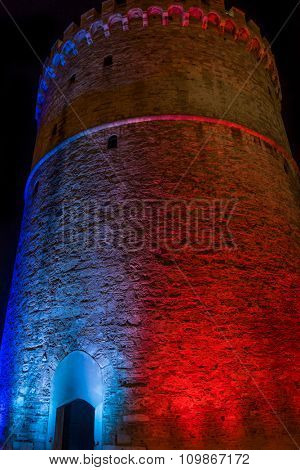 The white tower of Thessaloniki Greece illuminated with the colors of the French flag in memory of the Jihadists ISIS Terrorist Raid in Paris, 2015 in Thessaloniki.