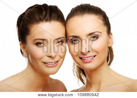 Two attractive sisters with make up.