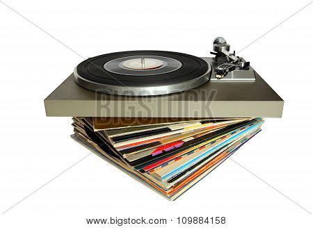 Vintage Record Player On A Stack Of Old Vinyls Isolated