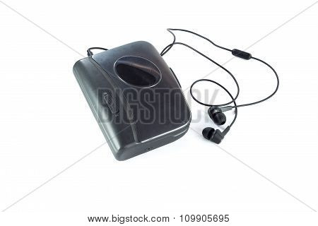 Cassette Player And Black Earphones Isolated