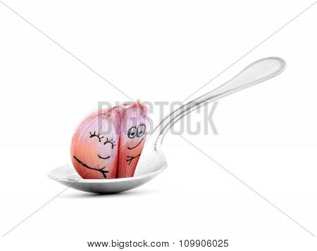 Garlic Cloves Couple Smiling And Hugging In Spoon Isolated