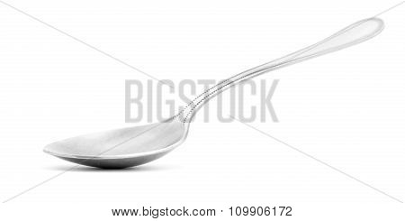 Gray metal shiny spoon isolated on white background