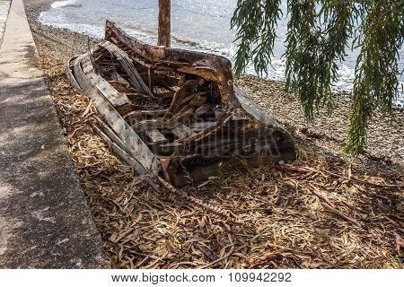 An Old Destroyed Boat On The Beach