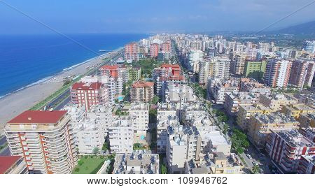 Coastal city Alania at summer sunny day. Aerial view videoframe