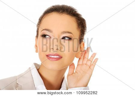 Beautiful african american businesswoman overhears.