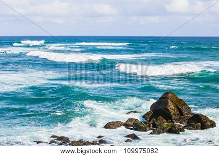 Rocks In The Waves