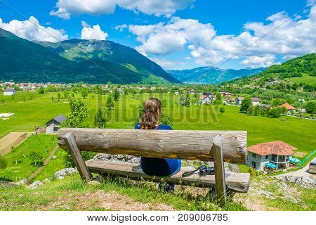 A Young Girl Dreams On A Wooden Bench Near The Sources Of Ali Pasha.