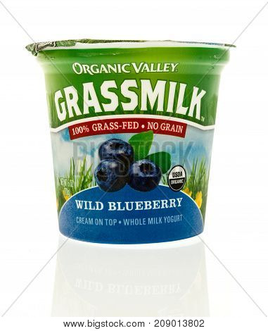 Winneconne WI - 12 October 2017: A container of Organic Valley Grassmilk yogurt on an isolated background.