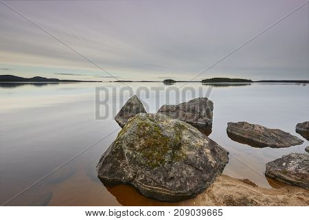 Finland landscape with lake and rocks at sunset. Koli. Pielinen