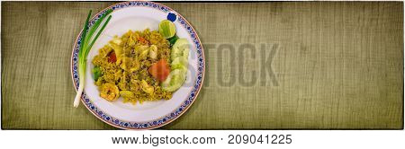 A Dish of Stir Fried Rice with Curry Squid and Shrimp
