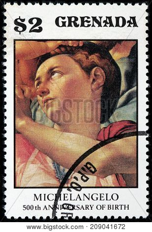 LUGA RUSSIA - OCTOBER 6 2017: A stamp printed by GRENADA shows fragment of panel painting Doni Tondo or Doni Madonna by Michelangelo Buonarroti circa 1975