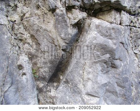 Explosion blow hole which is filled with explosive and the face of the stone is blown away