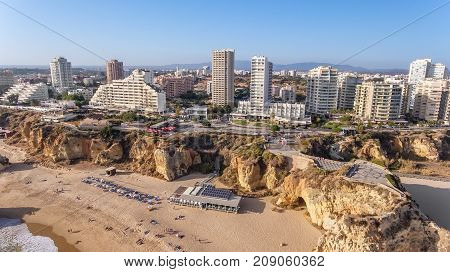 Aerial. The city of Portimao shot by drones, view from the sky.