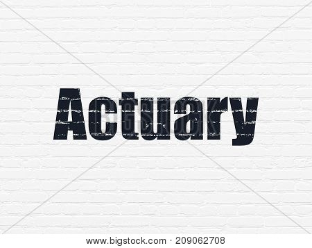 Insurance concept: Painted black text Actuary on White Brick wall background