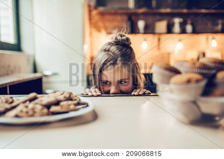 Little Girl On Kitchen