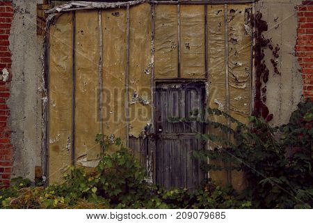 Old Door. Old Doors. Image of wooden door. Old House. Old Wooden Door On Brick Wall. Old Wooden Door.
