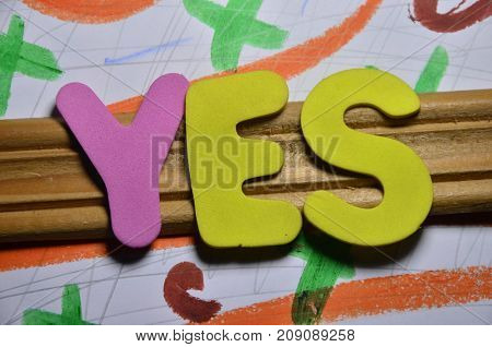 the word yes on a  abstract colorful background