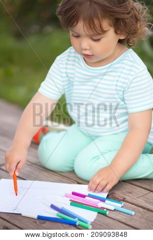 Cute Toddler Girl Drawing With Felt-tip Pens
