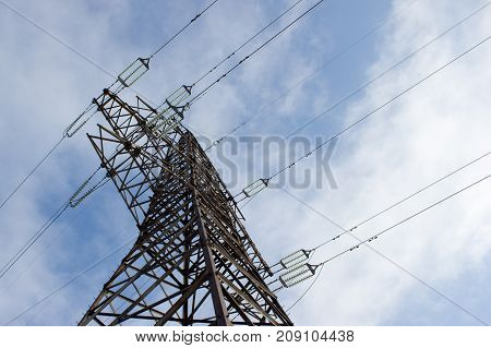 High voltage line on blue sky background