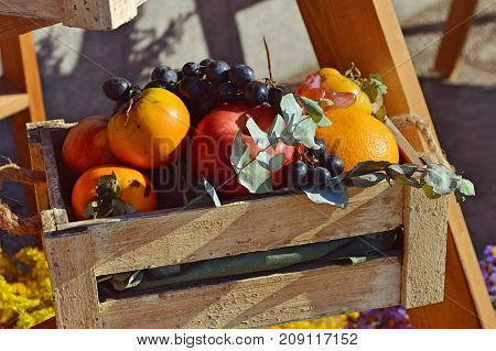 Fresh colourful fruit basket in the outside grocery