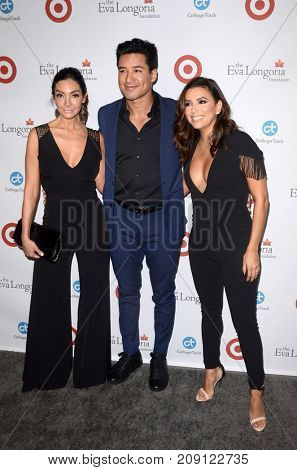 LOS ANGELES - OCT 12:  Courtney Mazza, Mario Lopez, Eva Longoria at the Eva Longoria Foundation Annual Dinner at the Four Seasons Hotel on October 12, 2017 in Beverly Hills, CA