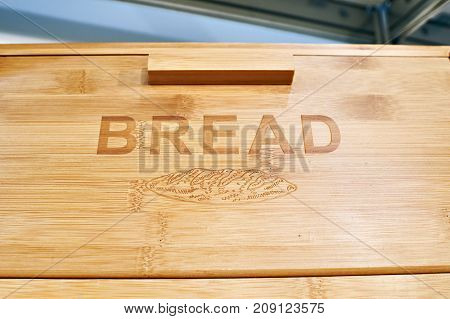 The wooden breadbasket for bread with text