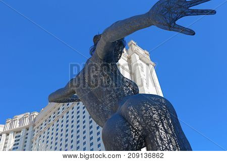 LAS VEGAS - October 07 : The Bliss Dance Sculpture display at the T-Mobile park in Las Vegas on October 07, 2017. The 40-foot-tall sculpture of a dancing woman created by artist Marco Cochrane.