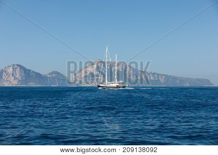 The Island of Capri is a very picturesque luxuriant and extraordinary location in Italy famous for its high rocks.