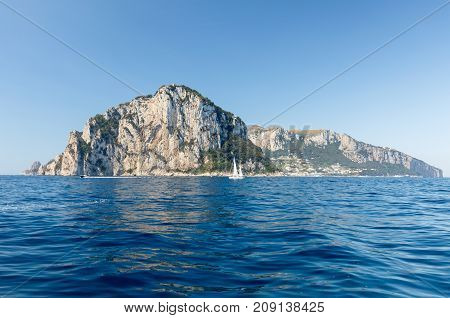 The Island of Capri is a very picturesque luxuriant and extraordinary location in Italy famous for its high rocks.