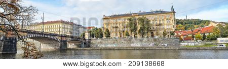 Prague, Czech Republic - October 10, 2017: Old and beautiful Legion Bridge is a historical granite bridge over the Vltava in Prague, Czech Republic, named after the Czechoslovak Legion. Panorama.