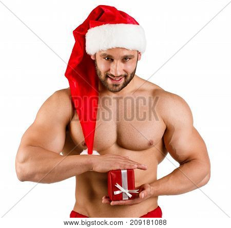 Naked muscular men in a Christmas hat with a small red gift in their hands. Isolated on white background.