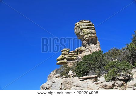 Hoodoo rock formation at Windy Point on Mount Lemmon in Tucson, Arizona, USA in the Santa Catalina Mountains located in the Coronado National Forest with blue sky copy space.