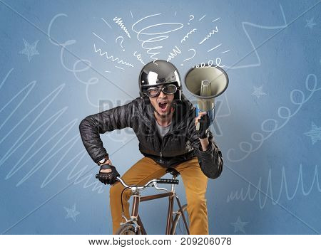 Young foolish crazy rider with doodle on the background