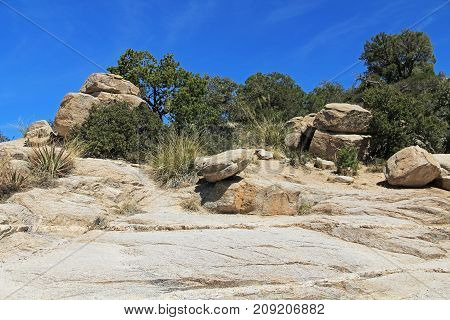 Windy Point on Mount Lemmon in Tucson, Arizona, USA in the Santa Catalina Mountains located in the Coronado National Forest with blue sky copy space.