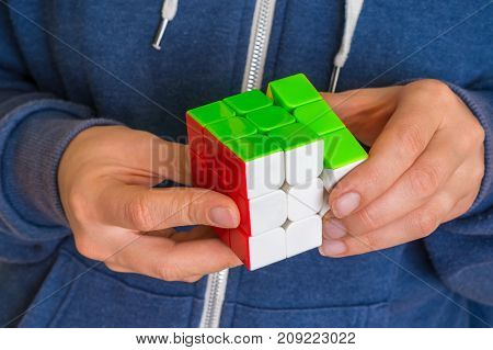 Rubik's Cube In Female Hands - Game For Solving Problems