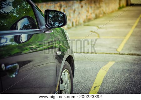 Car parked on the roadCar parked on the streetCar driving on road