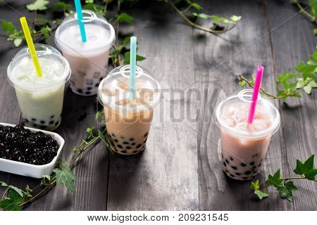 Milky Bubble Tea With Tapioca Pearls In Plastic Cup
