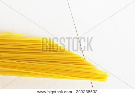 Raw spaghetti on a white background isolated