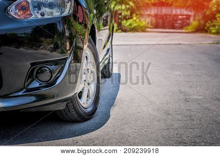 Car parked on the roadCar parked on the streetCar driving on road