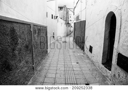 Rabat Morocco. Empty streets of old town Rabat medina Morocco. It is an administrative city but very popular among tourists with famous historical architecture. Black and white